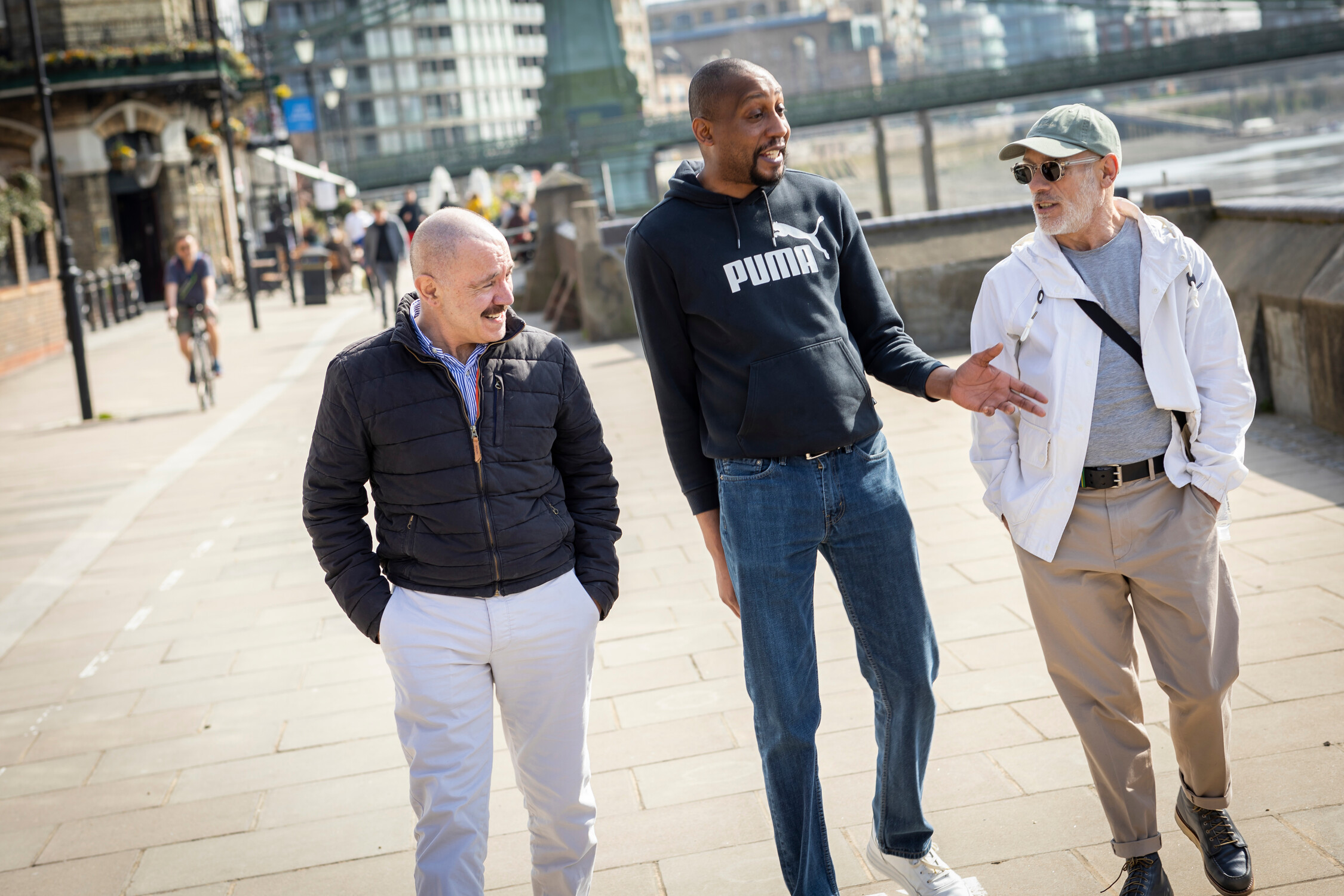 Group walking by river