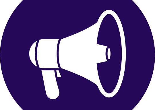 a white megaphone on a purple background