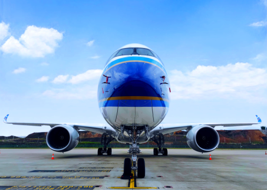 An airplane parked on a runway