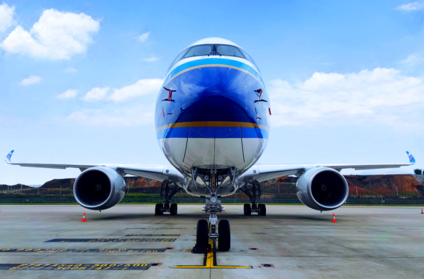 An airplane parked on a runway